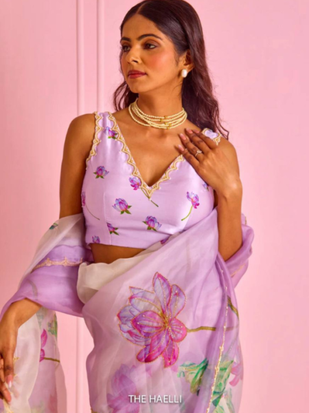 Women's Exquisite Lavender & White Organza Saree with Hand-Painted Lotus Floral Motifs & Gold Embellished Border – Complete with Matching Printed Blouse for Festive & Special Occasions